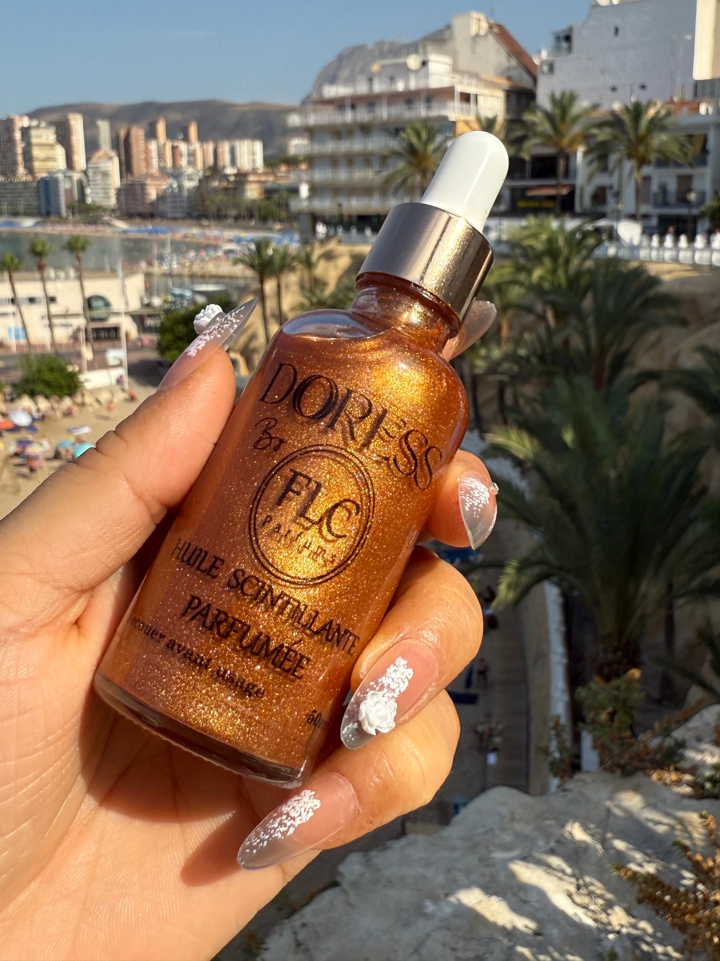 Huile scintillante parfumée